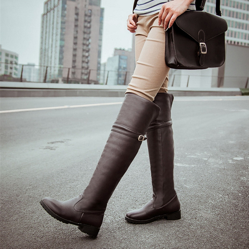 flat heeled knee high boots